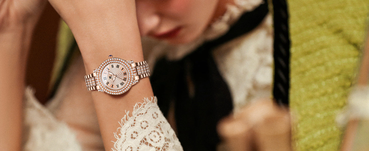 Rose gold watch on a wrist with a blurred background